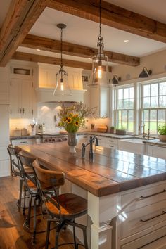 a large kitchen with an island in the middle