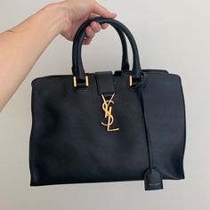 Authentic Black Saint Laurent Cabas Bag Normal Wears On The Leather And Metal As The Pictures Show, In Very Good Condition No Strap, Only Bag Size L 11.5 H 8 W 5 Ysl Cabas Bag, Bags Ysl, Saint Laurent Bag, Kate Spade Top Handle Bag, Womens Tote Bags, Calf Skin, Saint Laurent, Top Handle Bag, Monogram