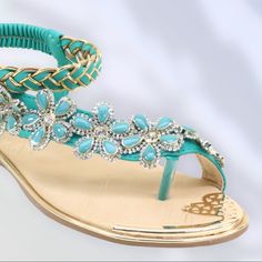 Italina Green Floral Rhinestone Embellished Elastic Slingback Flatform Sandal This Thong Sandal Is Great To Dress Up, Or Dress Down; Day To Night. The Soft Elastic Slingback Keeps Your Foot Secure & Comfortable. This Sandal Is Embellished W/ Green Daisy Flowers, Silver Rhinestones, A Gold Plated Design At Inner Toes & A Gold Braid. The Insole Is Purposefully Brushed W/ Metallic Gold Strokes. All Materials Are Faux Leather & This Sandal Runs True To Size Italina Floral Rhinestone Thong Flat Sanda Elegant Jeweled Sandals For Summer, Elegant Jeweled Summer Sandals, Embellished Wedding Sandals For Summer, Summer Jeweled Open Toe Sandals, Spring Rhinestone Slingback Sandals, Spring Slingback Sandals With Rhinestones, Elegant Stone Embellished Sandals For Summer, Elegant Stone-embellished Sandals For Summer, Elegant Stone-embellished Summer Sandals