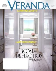 the front cover of veranda magazine featuring an open door and living room with white furniture