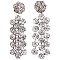 5 Tier & floating cluster drops. Wide Chandelier earrings. 6.50cts of natural round diamonds: Rounds, Full Cut brilliants. G-color, Vs-2 clarity. 18kt. white gold 19 grams. Earrings measure: 2 inch long .6 inch wide Cluster top: .41 inch Comfortable butterfly closure Diamonds hand selected from finest parcels. More photos and videos on request. $26,000 Appraisal Certificate to accompany Wide Chandelier, Pearl Dangle Earrings, Pearl Earrings Dangle, Antique Earrings, Chandelier Earrings, Amazing Jewelry, Diamond Bracelet, Round Diamonds, Jewelry Earrings Dangle