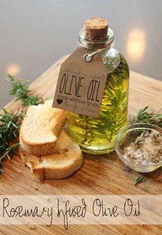 rosemary infused olive oil and bread on a cutting board