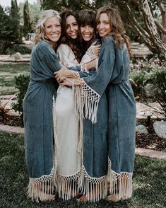 three women in robes hugging each other with the words find of the day on it