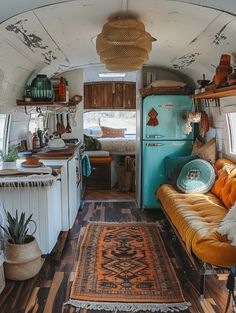 the interior of an airstream is clean and ready to be used as a kitchen