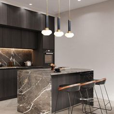 a kitchen with marble counter tops and bar stools