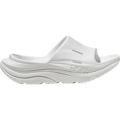 After we've racked up the miles on our road or trail run, we treat our feet to the cloud-like comfort of the HOKA Ora 3 Recovery Slide. This slide features a generous amount of plush EVA cushioning for tired feet and adds an element of sustainability with a sugarcane midsole and footbed. White Outdoor Running Shoes With Removable Insole, Outdoor White Running Shoes With Removable Insole, White Slides With Arch Support For Outdoor, Functional White Slides With Cushioned Footbed, Hoka Shoes Woman, Hoka Shoes, Conscious Fashion, White Flats, Mens Slippers