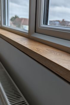 a window sill with a radiator in front of it