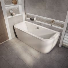 a large white bath tub sitting in a bathroom