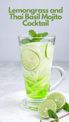 lemongrass and thai basil mojito cocktail in a glass with mint garnish