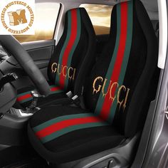 the interior of a car with gucci seat covers