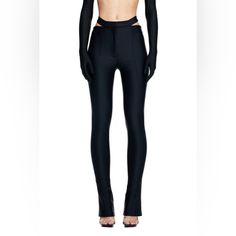 Mugler H&M. Fitted Pants In Thick, Stretch Jersey With A Sheen. Detached Waistband With A Skin-Peeking Cut-Out Section At Back And Discreet Zip Fly At Front With Concealed Button And Hook-And-Eye Fastener. Extra-Long Legs With Stitched Creases At Front And Back And Extra-Flared Hems. Sizethe Model Is 178cm/5'10" And Wears A Size 4 Fitfitted Compositionpolyamide 78%, Spandex 22% Additional Material Informationlining: Cupro 100% Fitted Trousers With Belt Loops, Fitted Leather Trousers, Fitted Straight Pants With Belt Loops, High Stretch Elastane Trousers, Black Elastane Pants With Belt Loops, Fitted High-waisted Pants With Belt Loops, Fitted Elastane Bottoms With Belt Loops, Chic Fitted Full-length Leggings, Fitted High Waist Elastane Pants