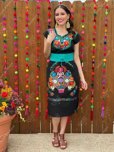 -This Beautiful Long Mexican Colorful Floral Dress is the perfect dress for a fun night out or a special event. -It is full of colorful embroidered flowers and has some crocheted details. -This dress has ties on the back in order to adjust the fit. - You can purchase the dress either with or without the belt. Please note: The accesories shown with this dress may purchased as well and Can be found in this links Earrings:https://www.etsy.com/es/listing/855938626/aretes-mexicanos-de-filigrana-arete Fitted Party Dress For Day Of The Dead, Black Short Sleeve Dress For Fiesta, Fitted Black Dress For Fiesta, Mexican Kimono, Mexican Inspired Dress, Mexican Traditional Dress, Mexican Bridesmaid Dresses, Mexican Clothes, Jeans Wedding