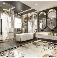 a bathroom with marble walls and flooring, mirrors on the wall above the bathtub