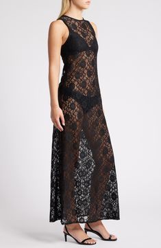 Lovely floral lace romances this sheer maxi dress designed in a sleeveless silhouette with slits at the sides. Exclusive retailer Crewneck Sleeveless Sheer 100% polyester Machine wash, line dry Made in the UK Sleeveless Scalloped Lace Maxi Dress For Party, Sleeveless Maxi Dress With Scalloped Lace For Party, Black Maxi Dress With Lace Bodice, Black Lace Bodice Maxi Dress, Sleeveless Maxi Dress With Lace Back For Night Out, Lace Maxi Dress With Spaghetti Straps And Lace Back, Sleeveless Evening Maxi Dress With Scalloped Lace, Black Maxi Dress With Lace Back, Sleeveless Lace Trim Maxi Dress For Night Out