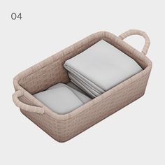 a wicker basket with folded sheets in it and the lid open to show what's inside