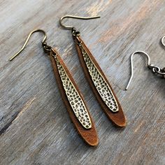 A chic and boho mix of leather and metal in these perfect everyday earrings. These earrings feature U.S. tanned leather mixed with textured metal classic and french ear wires in either antique brass, antique silver or antique copper. Lightweight and easy to wear - you might forget you are wearing Diy En Cuir, Wood Jewelery, Reading Pa, Earring Trends, Earring Making