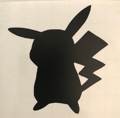 a black and white silhouette of a bunny with a lightning bolt in it's mouth