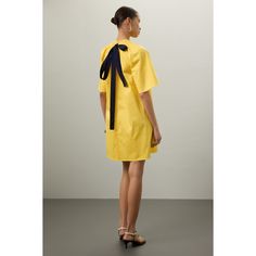 Yellow (75% Cotton, 22% Nylon, 3% Spandex). Casual dress. Mock neck. Short sleeve. Pull on closure. 36" from shoulder to hemline. Imported Spring Workwear Short Sleeve Mini Dress, Spring Mini Length Short Sleeve Work Dress, Spring Mini Length Short Sleeve Dress For Work, Chic Yellow Shift Dress, Stretch Short Sleeve Midi Dress For Daywear, Yellow Knee-length Mini Dress For Casual Wear, Fitted Yellow Knee-length Shirt Dress, Stretch A-line Mini Dress For Daywear, Yellow Stretch Short Sleeve Midi Dress