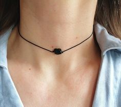 "Simple, chic, black tourmaline choker necklace; Tiny black cord choker to compliment a casual outfit; It's so fun to wear it everyday :) One rectangular raw black tourmaline crystal ; Stainless steel (non tarnish) lobster claps closure. Waterproof necklace, can be used in the water. Custom made lenght. Need another size? Please feel free to leave a message. Model wears 14\" length. Ready to give as a gift, this necklace comes wrapped in a nice jewelry pouch. Please notice that the pictures are Trendy Adjustable Black Choker, Trendy Black Adjustable Choker, Minimalist Black Choker As A Gift, Minimalist Adjustable Choker For Gift, Minimalist Adjustable Choker As Gift, Trendy Black Jewelry With Adjustable Cord, Black Minimalist Jewelry With Adjustable Cord, Casual Black Jewelry With Adjustable Cord, Minimalist Adjustable Cord Choker