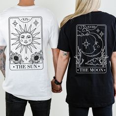 "These Sun Moon Couple shirts are perfect for anniversaries or any occasion where you want to express your deep connection. So grab your partner, put on these matching shirts, and let the world know that your love is written in the stars! It's time to celebrate your cosmic love story, and these shirts are here to make it even more magical. SOLD INDIVIDUALLY 💙How To Order?🧡 𝟏. Choose your shirt Size, 𝟐. Choose your shirt Color, 𝟑. Select the quantity, 𝟒. Click Add To Court. For multiple items go back to the listing and repeat the steps. If you have any difficulties, send us a message or click on the \"Request A Custom Order\" button and we'll create a private listing for you. 💙 Custom Design 🧡 Are you looking for a custom design? Please contact me, and I will be glad to help! 💙 Siz 1 Year Anniversary Gifts, Anniversary Shirt, Couples Anniversary, 1 Year Anniversary, Honeymoon Outfits, Boyfriend Anniversary Gifts, Year Anniversary Gifts, Matching Couples, Couple Shirts