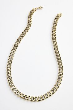 Curb chain style necklace in stainless steel. Essential necklace fitted with a lobster clasp closure. Features Colt stainless steel curb chain necklace Classic linked curb chain Lobster clasp closure Content + Care Stainless steel Wipe clean Imported Size Dimensions: 18" l | Colt Stainless Steel Curb Chain Necklace in Gold, Men's at Urban Outfitters Stainless Steel Curb Chain Jewelry, Stainless Steel Curb Chain Necklace For Gift, Cuban Link Necklace With Lobster Clasp, Cuban Link Stainless Steel Necklace With Gold Chain, Classic Stainless Steel Necklace With Chunky Chain, Stainless Steel Curb Chain Necklace As Gift, Classic Stainless Steel Necklace With Gold Chain, Stainless Steel Curb Chain Necklace Gift, Stainless Steel Cuban Link Chunky Chain Necklace