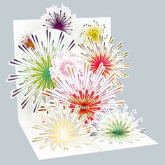 a card with fireworks on it and the words happy new year written in white paper