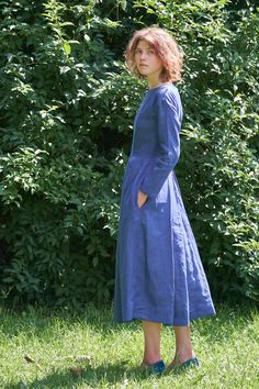 Introducing a graceful and modest church dress, perfect for any occasion. This timeless piece features long sleeves and an extra-full skirt, crafted from 100% linen with lining for comfort and style. Boasting pockets and available in over 10 colors, it's an ideal choice for any season.  Features * Natural fabric - 100% navy linen * 100% cotton lining * Available in different colors * Customized skirt length * Side pockets a ❃ For more information or if you have questions, please contact us, we a Modest Long Sleeve Dress With Modesty Panel, Modest Full-length Spring Dresses, Modest A-line Long Sleeve Dress For Spring, Fitted Long Sleeve Dress With Modesty Panel, Modest Spring Dresses With Modesty Panel, Modest Fitted A-line Long Sleeve Dress, Classic Long Sleeve Maxi Dress For Fall, Modest Blue Long Sleeve Midi Dress, Classic Long Sleeve Spring Dresses