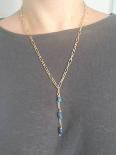 Blue Apatite Crystal Wire Wrapped in gold plated brass on 14K gold plated link chain. The total length including charms is 26 inches but can easily be adjusted to any link length. Blue Apatite is a wonderful stone for rejuvenating one's journey by providing the mind with inner visions, presenting the bigger picture of what one currently needs. This stone is a cleansing for the mind. Apatite Gold Necklace, Blue Apatite Crystal, Apatite Crystal, Gold Link Necklace, Bigger Picture, Gold Link Chain, Gold Link, Blue Apatite, Necklace Blue