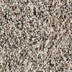 the texture of carpet is brown and white