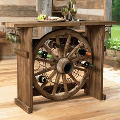 a wine rack made out of an old wagon wheel