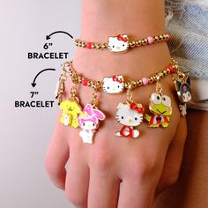 Say hello to the CHARM IT! x Hello Kitty Collection! This Gold Hello Kitty Stretch Bead Bracelet complete with an enamel Hello Kitty bead sets the stage for charms! Charmable stretch bracelets... wear one or stack for tons of fun. Add charms between the beads of this bracelet and customize their collection! © 2023 SANRIO OC., LTD. Used Under License. features & materials Enamel, Base Metal Two sizes: 6" length & 7" length WARNING: Choking Hazard - Small parts. Not for children under 3 years. Bra Sanrio Oc, Gold Hello Kitty, Jewelry By Brand, Picture Frame Ornaments, Disney Charms, Rainbow Beads, Hello Kitty Collection, Bead Kits, Jewelry Card