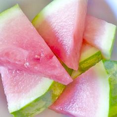 slices of watermelon on a white plate