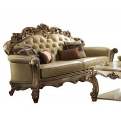 an ornately decorated couch and coffee table