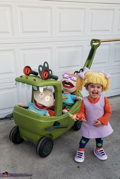 Angelica Halloween Costume, Rugrats Family Halloween Costume, Rugrats Halloween Costume Family, Decorating Wagon For Halloween, Rugrats Costume Family, Rugrats Family Costume, Stroller Wagon Halloween Costumes, Family Halloween Costumes With Wagon, Halloween Costume With Stroller