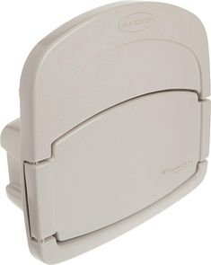 the back side of a white plastic object with its lid open and it's handle extended