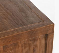 a close up of a wooden table with no one on it's legs or feet