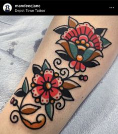 a woman's arm with flowers on it and the words doppi town tattoo