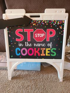 a sign that says stop in the name of cookies