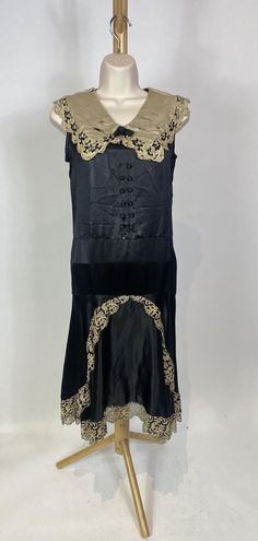 1920s Silk Collared Dress with Double Buttons Lace and Drop Waist | eBay Vintage Dresses With Historical Design For Party, Vintage Party Dress With Historical Design, Vintage Black Flapper Dress, Vintage Gatsby Style Dress, Art Deco Sleeveless Dress For Vintage Events, Vintage Fitted Sleeveless Flapper Dress, Vintage Black Flapper Dress For Formal Occasions, Formal Sleeveless Art Deco Flapper Dress, Fitted Vintage Flapper Dress For Vintage Events