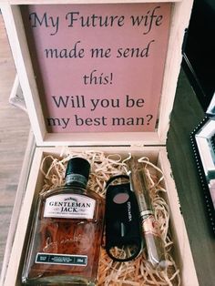 a bottle of whiskey in a wooden box with a message on the lid that says, my future wife made me send this will you be my best man?