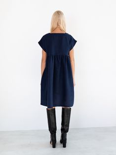 "POPPY is a loose fitting linen dress with side seam pockets. DETAILS - Below the knee length - Smock silhouette - Short sleeve - Side seam pockets - Oeko-Tex certified 100% midweight linen - Cut and sewn to order just for you in our studio COLOR - Navy blue, you can also choose other colors above - Fabric samples are available here https://www.etsy.com/listing/586569696/linen-fabric-samples SIZING & FIT - Relaxed fit - Length (shoulder to hem) is approximately - inches / - cm - Bust (pit to Linen Workwear Dress With Side Pockets, Casual Linen Work Dress With Side Pockets, Workwear Linen Dress With Side Pockets, Casual Workwear Linen Dress With Side Pockets, Blue Linen Dress With Pockets, Linen Dress With Pockets For Workwear, Knee-length Linen Midi Dress With Pockets, Oversized Blue Linen Dress, Blue Linen Knee-length Dress With Relaxed Fit