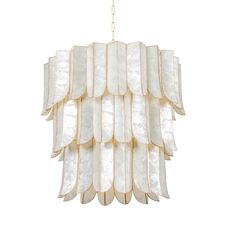 a white chandelier hanging from a gold chain