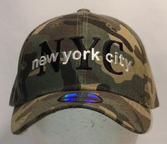 the new york city camo cap is on display