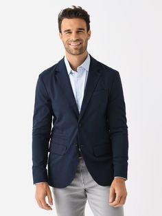 DESCRIPTION:For all-day, on-the-go comfort, this blazer has a tailored design while being easy to slip on and layer over a dress shirt, tee, or hoodie.FEATURES:Notch LapelLeft Chest PocketInterior PocketsFunctional CuffsFlap PocketsDouble Button ClosurePerformance Fabrication64% Organic Cotton, 31% COOLMAX® EcoMade Polyester, 5% ElastaneSlim FitModel is wearing size Medium blazer.Model's Measurements: Height: 6'2.5" | Waist: 34" | Inseam: 32" | Collar: 16" | Sleeve: 35" | Suit: 40L Tailored Design, Navy Blazer, Saint Bernard, Dress Shirt, Organic Cotton, Slip On, Size Medium, Blazer, Navy