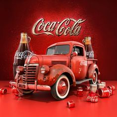 an old coca - cola truck is surrounded by coke cans and other items on a red background