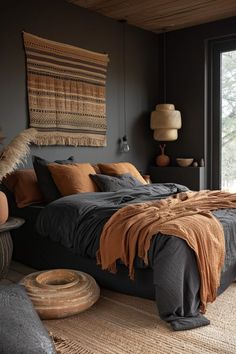 a large bed sitting in a bedroom on top of a rug next to a window