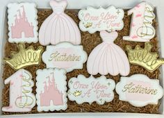 decorated cookies in a box with princess theme