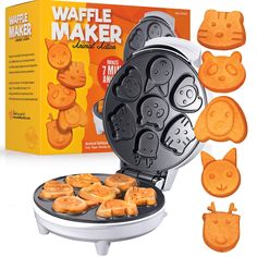 the waffle maker is being used to make cat shaped treats for cats and kittens