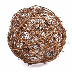 a ball made out of branches on a white background