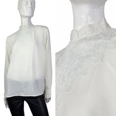 "By KB Lawrence, off white blouse with lace collar detail. Tagged 10/L. 21\" across  25\" long  23\" sleeves  NEW ITEM! DETAILS COMING SOON!  * Good preowned vintage condition with no major flaws to note. Usual wear is consistent with age. Sold as is. * FINAL PRICE as listed. No discounts. *ALL SALES FINAL. NO RETURNS or exchanges.  * Please review all pictures as they are part of the listing. Ask questions! * Please review all shop policies before completing transaction.  * Bundle up for combin White Lace Collar Long Sleeve Top, White Long Sleeve Top With Lace Collar, White Long Sleeve Lace Top With Lace Collar, White Lace Top With Lace Collar, Formal Long Sleeve Blouse With Lace Trim, Formal Long Sleeve Lace Top With Lace Trim, Classic Cream Blouse With Lace Collar, Formal Long Sleeve Blouse With Lace Collar, Long Sleeve Lace Top With Lace Collar For Wedding